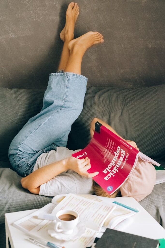 Woman Lying with Legs Raised on Wall